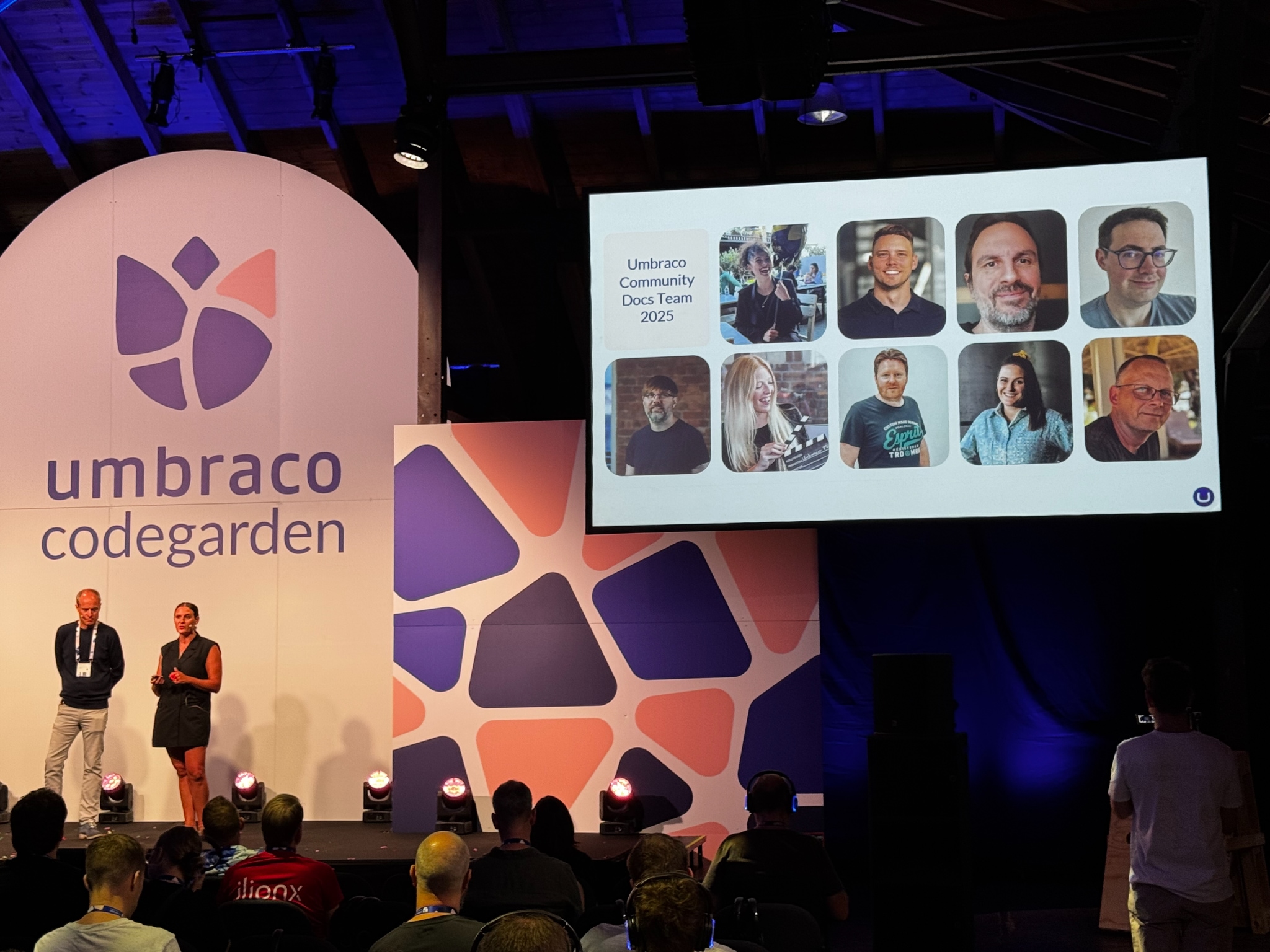 Umbraco Codegarden stage with Umbraco community docs Team 2025 slide displayed